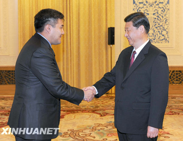6月23日，中共中央政治局常委、国家副主席习近平在北京人民大会堂会见由第一副主席卡列塔耶夫率领的哈萨克斯坦“祖国之光”人民民主党代表团。