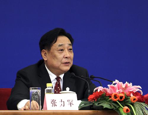 这是张力军回答记者提问。新华社记者 费茂华 摄