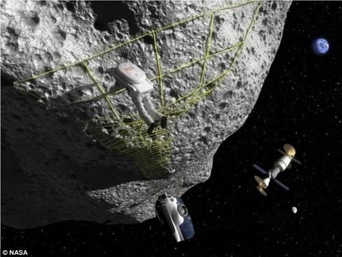 美国宇航员在海底巨大岩石上模拟登陆小行星